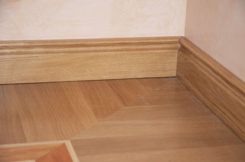 Damaged Baseboard Before Repair
